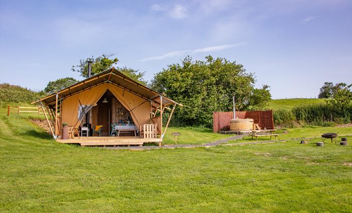 exterior of safari tent and hot tub